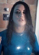 Bianka in sexy tight blue latex gets hard and horny on the shower