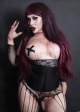 Fetish Voluptuous Tranny in Fishnets covered in Blood